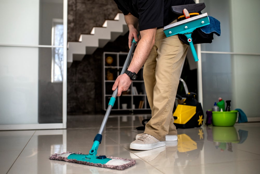 https://cityfurnish.com/blog/wp-content/uploads/2023/09/man-doing-professional-home-cleaning-service-min-1.jpg