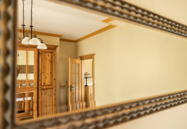 Utilize mirrors to enhance the light and space in your home.